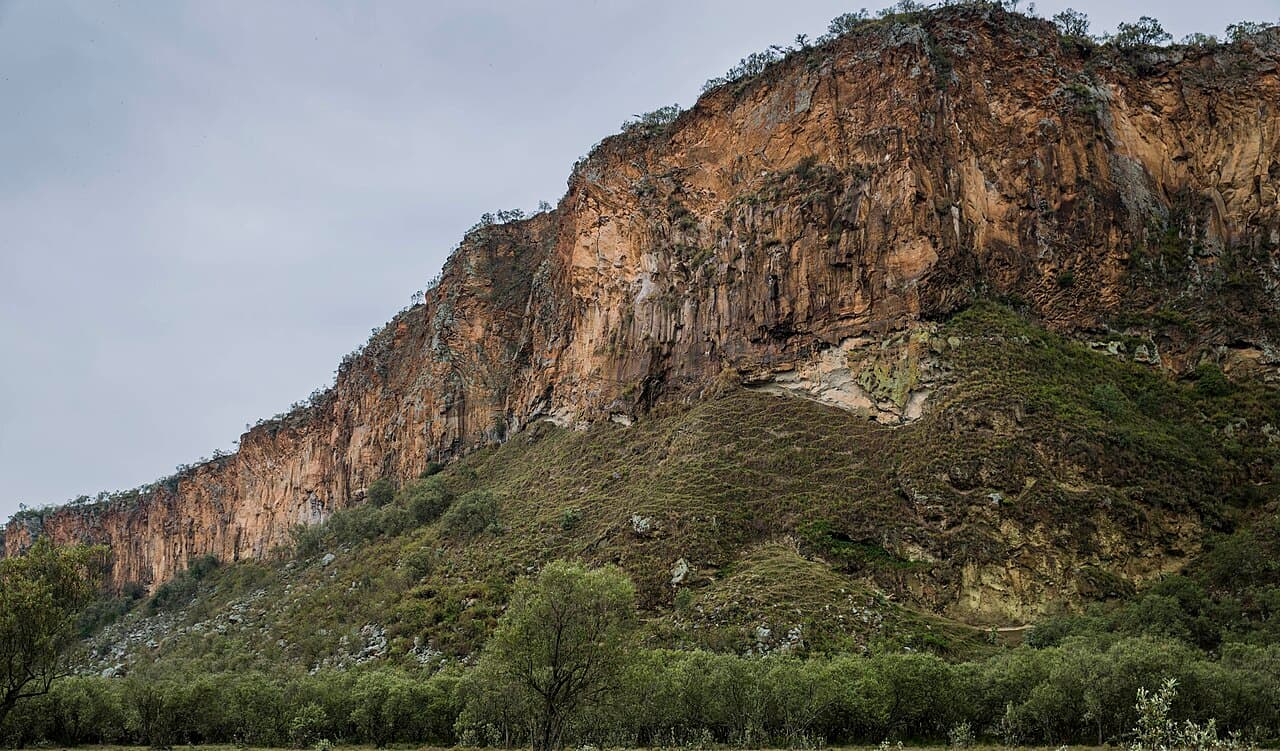 Rocky escarpment and vegetation in Hell's Gate National Park near Naivasha