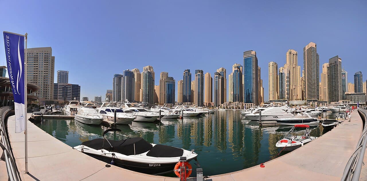 Panoramic view of yachts and towers at Dubai Marina